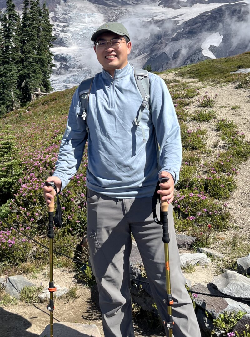 Mingsheng Tian hiking in the mountains